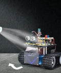 Mini Smart Tank Robot V3 Programmable STEM Car Kit Compatible With Arduino And Mixly For Line Tracking Light Following And Fire Extinguishing Projects Great For Teens And Makers Hands On Learning, tracked robot spraying mist on black surface
