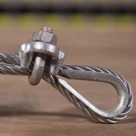 Close-up of stainless steel cable clamp from Beefy 60 Piece M6 One Quarter Inch Wire Rope Accessory Kit With 20 Stainless Steel Cable Clamps 20 Thimbles And 20 Aluminum Crimp Sleeves For One Quarter Inch Rope Pro Grade Heavy Duty Rigging Set