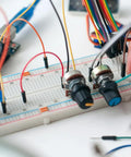 Dope Prototyping Breadboard Kit With Four Boards And 130 Jumper Wires ABS Plastic With Tin Plated Contacts in use