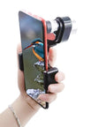 Person holding a smartphone with an Angled Monocular For Travel And Live Events Quick Focus Pocket Telescope attached viewing a bird.