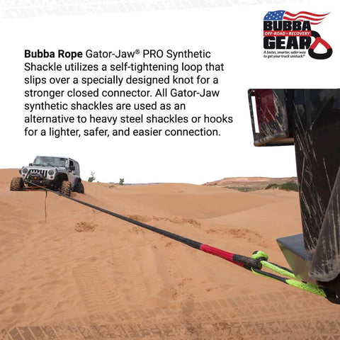 Gator Jaw Pro Synthetic Shackle 7/16 Inch For Off Road Recovery And Vehicle Towing Ready For Rough Terrain Heavy Duty Tow Rescue Gear With 52,300 Lbs Break Strength In Red connecting two vehicles on sand.