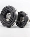 Bombproof Adjustable Furniture Leveling Legs With Thick Anti Skid Rubber Pads And Rust Proof Steel Base close-up view of rubber pads and steel bolts.