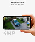 Person viewing footage on phone from Solar Powered Wireless Outdoor Security Camera System Kit With Four Cameras, 4MP HD Video