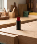 Matte Black Retractable Table Stop and Bench Anchor for workbenches, 20mm diameter, slip-free precision positioning shown on workbench