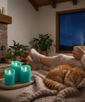 Cozy living room with turquoise real wax flameless candles set of 3, teal LED pillar candles with remote and timer.