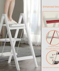 Heavy Duty Three Step Folding Ladder With Wide Non Slip Pedals 330 Lbs Load Capacity Lightweight Portable Step Stool For Kitchen Closets Cleaning And Space Saving Easy Open Fold Flat For Quick Storage, white metal 3-step ladder in use