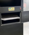 Kickass Dust Collection System For Eight Inch Angle Grinders featuring a black cabinet with an open door exposing filter.
