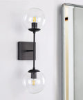 Black Double Wall Sconce Vanity Light With Two White Glass Globes Mid Century Modern Globe Lighting For Bathrooms And Bedrooms Waterproof Matte Black Fixture Designed For Wet Areas Easy Install shown beside a mirror