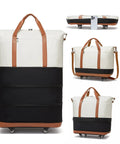 Expandable wheeled travel duffel bag, two-tone white top and black bottom with tan handles