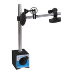 Dial indicator with magnetic base on an adjustable chrome arm stand; blue base label visible