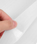 Close-up of a hand holding white EPE foam from 100 Pack White EPE Foam Pouches For Fragile Items And Ceramics, Reusable Cushion Foam Bags