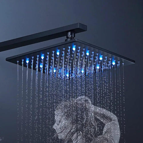 LED Rain Shower System With High Pressure 12 Inch Square Rain Head with blue LED lights, illustrating water flow