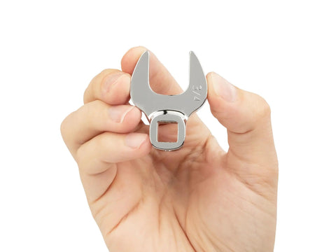 Hand holding a 3/8 Inch Drive Crowfoot Wrench Set, 13-Piece Includes 5/16 to 1 Inch, Ultra Compact Design for Tight Spots, single piece.