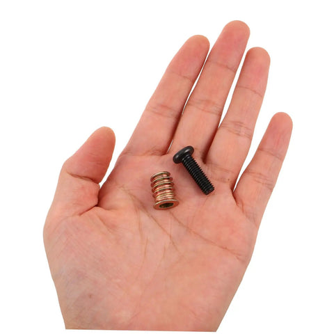 Hand holding metal threaded wood insert and bolt from 50 Pieces Metal Threaded Wood Inserts Set With Bolts And Screws Plus Two Wrenches