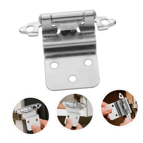 Inset cabinet hinge with mounting plate and soft-close mechanism; close-up, silver metal