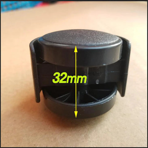 Front view of black plastic heater wheel, 32mm diameter, replacement caster for electrical oil heaters.