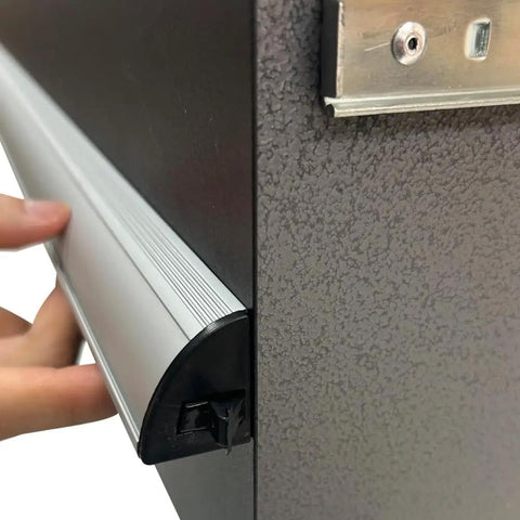 Close-up of Heavy Duty Metal 4 Drawer Storage Cabinet For Garage And Workshop handle, showing tough steel construction.