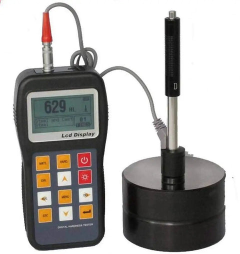 Portable Hardness Tester Handheld On The Go With Built In Printer Color Display And 600 Data Memory Measures Steel Cast Iron Alloy Tool Steel Aluminum Brass Copper Ductile Iron And Forged Steel On Seven Hardness Scales device with cables and digital screen displayed.