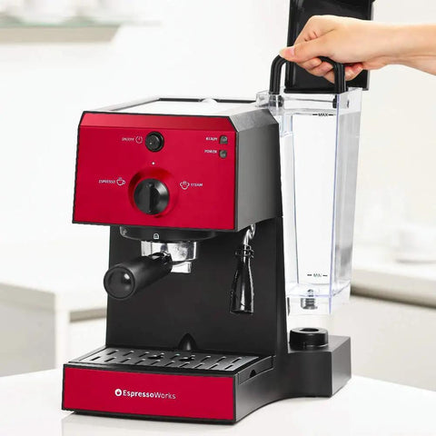 Badass 15 Bar Espresso Machine And Cappuccino Maker With Slick Milk Steamer and Hella Easy 7 Piece Barista Bundle Featuring Quick Grinder And Dual Cups For No Sweat Latte Prep And Knockout Drink Quality Daily In Blue, showing red espresso maker with steam knob and visible water tank.