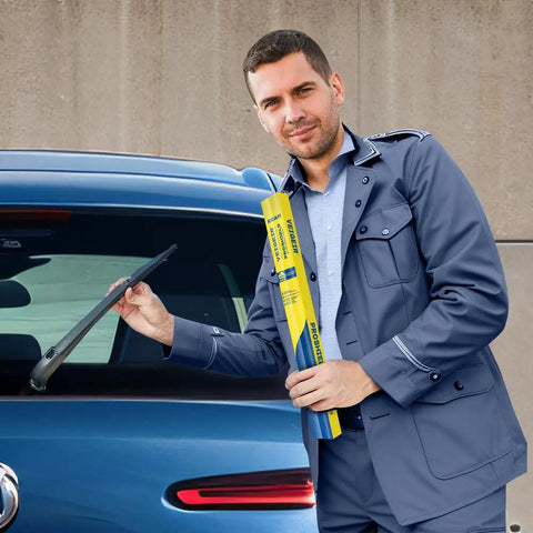 Man holding box of 14 Inch Rear Wiper Blade for Mazda 3 and CX Series SUVs, installing on blue vehicle for all-weather clarity