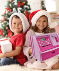 Children with ATM Style Talking Piggy Bank For Kids With Coin Reader Balance Calculator Password Protected Card Access Alarm Clock Pink Gift For Birthdays And Savings Milestones by Christmas tree.
