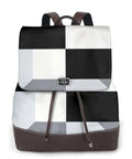 Kick Up Your Daily Fit With This Slick Black And White Piano Grid Womens Leather Backpack Featuring Waterproof Build And Hella Spacious Storage For Travel Or Work, front view showcasing the design.