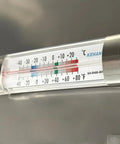 Thermometer on Commercial Buffet Cold Table Refrigerator for accurate temperature monitoring, crucial for food safety.