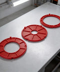 Heavy Duty Insertion Ring Set Crafted For RA1171 RA1180 RA1181 Router Tables showing three red plastic drop-in rings on a gray surface.