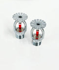 Two Rock Solid Pendent Fire Sprinkler Heads With Chrome Plated Copper Body 1/2 Inch Npt Thread, showing chrome finish and red activation element.