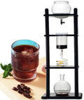 Smooth Sip Premium Ice Drip Coffee Maker For Cold Brew Tower With Pine Wood And Glass Holds 5 To 8 Cups with iced coffee.