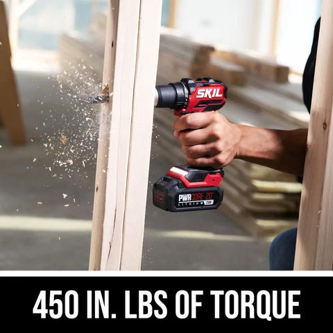 Pwr Core 20 Brushless 20V Compact Drill Driver in action, wood drilling, showcasing power, 450 in-lbs torque, ideal for tight spaces.