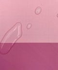 Close-up of Rose Pink Stripe Peel And Stick Wallpaper Self Adhesive Vinyl Removable Wall Covering For Cabinets Drawers DIY Room Flip With A Rad Chic Vibe Easy Apply Covers Forty Eight Total Sq Ft with water droplets.