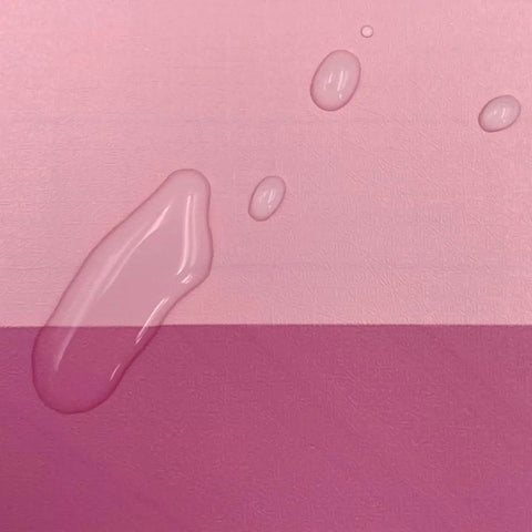 Close-up of Rose Pink Stripe Peel And Stick Wallpaper Self Adhesive Vinyl Removable Wall Covering For Cabinets Drawers DIY Room Flip With A Rad Chic Vibe Easy Apply Covers Forty Eight Total Sq Ft with water droplets.