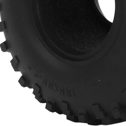 Close-up of rugged black tire surface showing textured tread pattern and sidewall details, suitable for electric bikes and scooters.