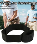 Real Time Golf Swing Trainer Arm Band For Connection And Stability, black elastic band on golf course, promoting correct posture