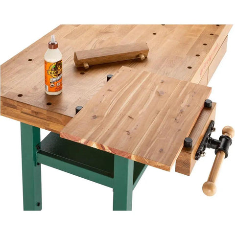 Heavy Duty Solid Oak Workbench With Bulletproof Steel Legs And Dual Vise Setup Featuring Smooth Riding Storage Drawers Plus Removable Bench Dogs, detailed view of the oak surface and storage.