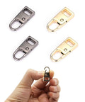 4 Pack Zipper Pull Tabs Replacement Metal Zipper Handles For Luggage Suitcases Jackets Backpacks Coats Boots Gunmetal Black And Gold Easy No Fuss Zip Repair Kit, showing four metal zipper handles in gunmetal black and gold, with hand holding one.