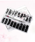 Solid Gear Carbon Steel Miniature Screw Assortment Loaded With Round Head Countersunk Bolts Inside A Compact Travel Kit For Hassle Free Notebook Glasses Repairs with assorted black screws and a screwdriver.