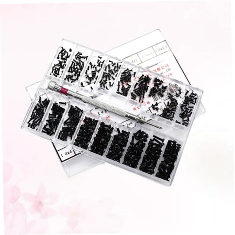 Solid Gear Carbon Steel Miniature Screw Assortment Loaded With Round Head Countersunk Bolts Inside A Compact Travel Kit For Hassle Free Notebook Glasses Repairs with assorted black screws and a screwdriver.