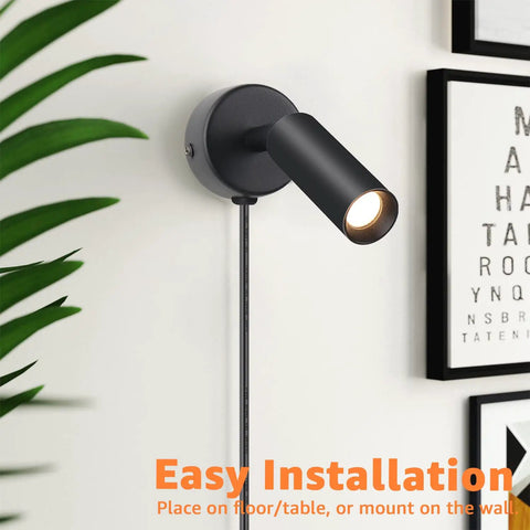 2 Pack Indoor Spotlight LED Uplights For Plants 120V mounted on wall next to artwork, 3W warm white light with foot switch