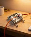 Solid Aluminum Soldering Wire Fixture With Ceramic Jaws And 4-Position Circuit Board Mounting Clamp For Adjustable PCB Wire Holder on a wooden desk.