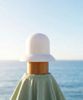 Upgrade Your Shade Game With Sturdy White Patio Umbrella Pole End Cap Replacement Kit Featuring Quick Tool-Free Install, Wind Resistance And Scratch Protection For Beach Tents And Garden Canopies on wooden pole