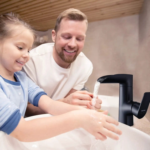 Child and adult using Matte Black Bathroom Faucet With Modern Waterfall Spout, 360 Degree Swivel, Single Hole Deck Mount, ABS Construction