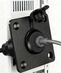 Beefy Metal Electrical Outlet With Slick Ergonomic Plug Design No Sweat Easy Install For Camping Rv Satellites And Mobile Living Spaces Dependable Five Amp Power Rig close-up view of rugged black outlet mounted securely.