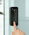 Anti Theft Angle Mount For Blink Video Doorbell 2025 2nd Gen in use; installed with adhesive on glass door; person pressing button.