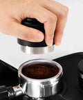 Pro Grade 51mm Coffee Distributor Leveler Heavy Duty Stainless Steel Espresso Tool pressing down coffee grounds evenly