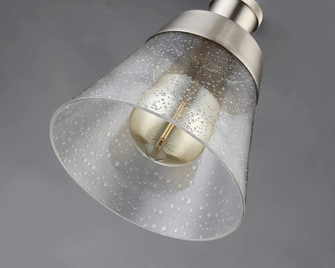 Dope Handblown Seeded Glass Pendant Light With Brushed Nickel Finish showing close-up of seeded glass and Edison bulb style