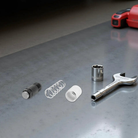Floor Jack Replacement Parts Repair Kit With Piston Pump Plunger And Spring Assortment For DIY Auto Maintenance And Vehicle Repair In The Garage Iron And Rubber Materials on floor