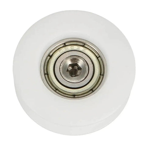 Close-up of one wheel from the Set Of Four Metal V Groove Pulley Wheels For Threaded Rod Bearings, 6x22x8mm, white, heavy duty.