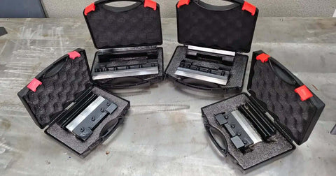 Multiple cases with 6 Inch Magnetic Vise Mount Metal Brake Bender for DIY metalworking, showing removable fingers, on a workbench.